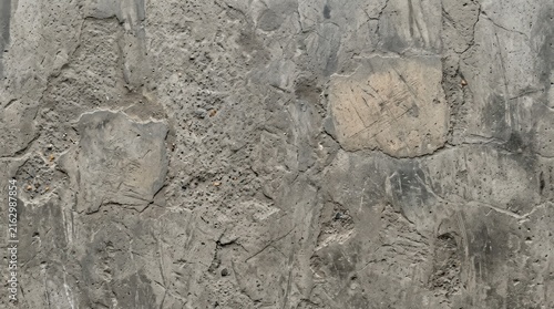 Rough concrete wall texture with natural stone pattern for background use