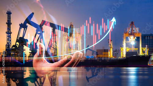 Double exposure of businessman with refinery plant and Crude Oil pump oil rig energy industrial machine for petroleum background