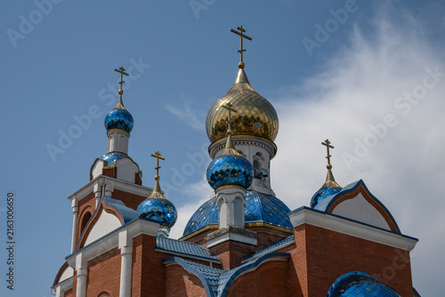 Fotografie The domes of the regimental church of the Azov Icon of the Mother of God is close‑up