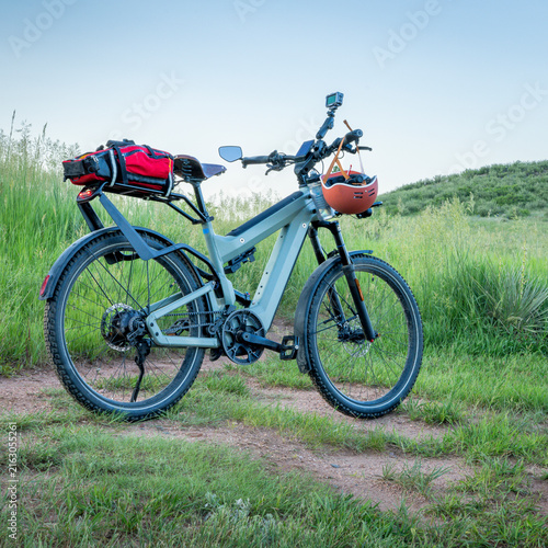 touring e-bike on a prairie biking trail in Colorado foothills