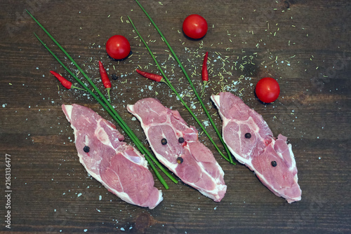 Lamb steak on the wooden plate