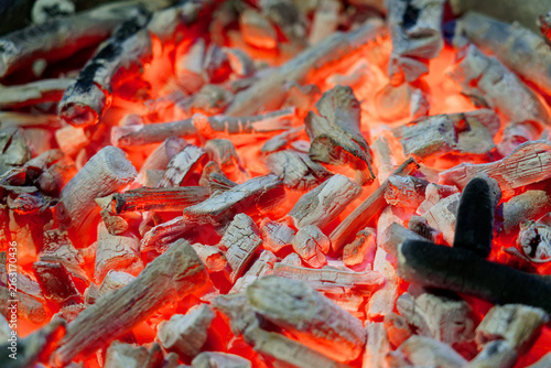 actively smoldering embers of fire