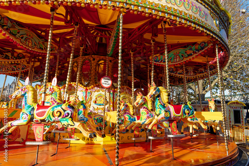 Obraz na płótnie Beautifully decorated carousal horses on a merry-go-round