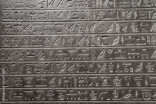 Ancient Egyptian stone with hierogliphs in low graving