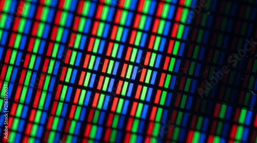 Close-up of liquid crystal display pixels in vibrant colors  