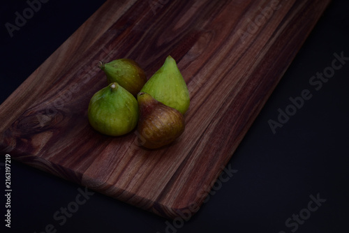 Figs on a wooden chopping board
