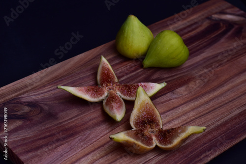 Fresh ripe figs whole and sliced for serving