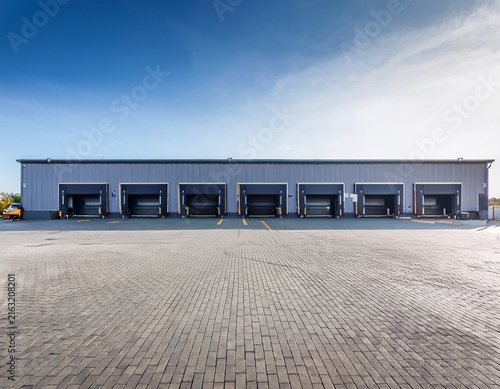 modern warehouse building exterior with loading docks