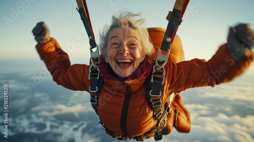 Cheerful pensioner flying with parachute in the sky. Cheerful pensioner flying in the sky, experiencing the drive