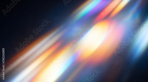 Vibrant colorful light rays abstract background with dynamic motion blur and prism effect