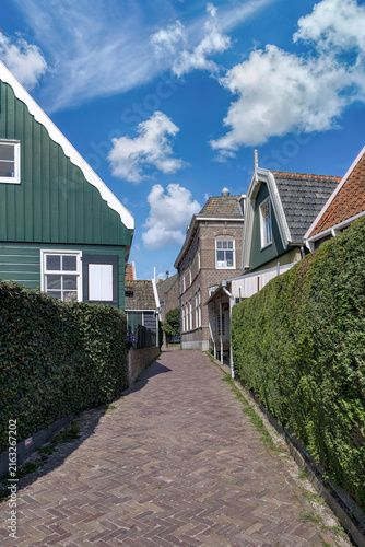 Marken is a peninsula connected by a causeway to the waters of Lake Ijssel, in the Netherlands, located in the municipality of Waterland in the province of North Holland.
