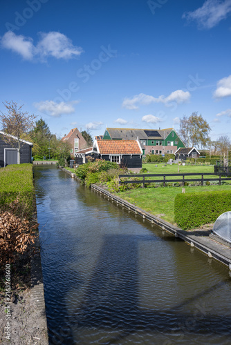 Marken is a peninsula connected by a causeway to the waters of Lake Ijssel, in the Netherlands, located in the municipality of Waterland in the province of North Holland.
