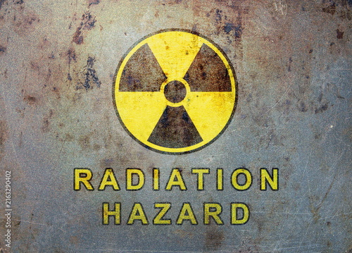 radiation hazard sign on rusty metal surface