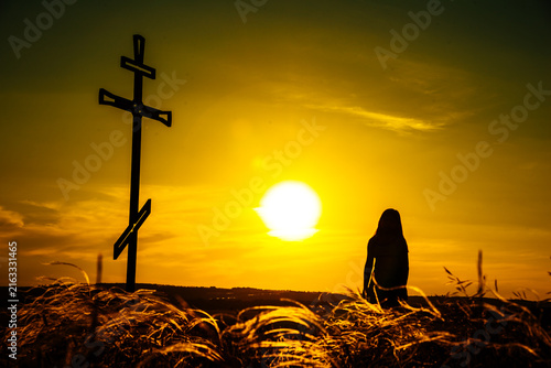 Canvas Print the man standing in front of the cross