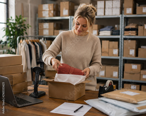 Small Business Owners Packing Online Orders for Shipping