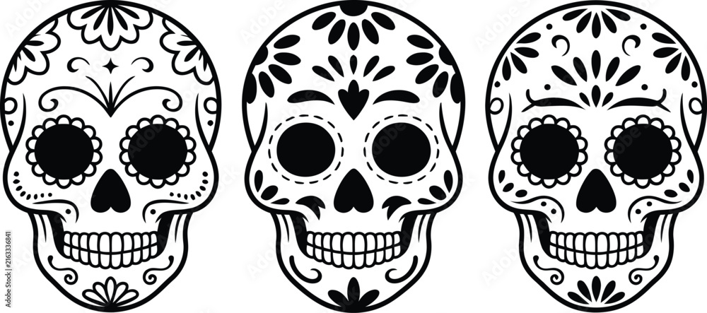 Fototapeta premium Three decorated skulls with floral patterns