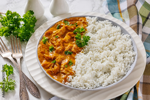 Spiced chicken curry with cooked long grain rice