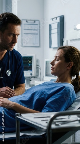 Caring Doctor Discusses Recovery With Patient In Modern Hospital Room