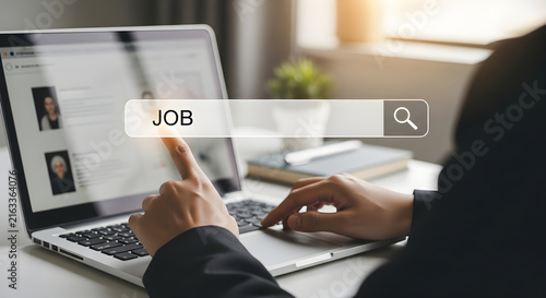 Professional Searching for Career Opportunities Online via Job Search Website on Laptop Screen