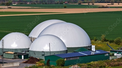 Fotografía Large Biogas Digesters with Solar Panels in Agricultural Landscape