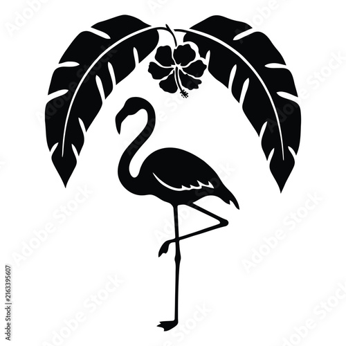 A black flamingo with tropical leaves and hibiscus flower is a silhouette