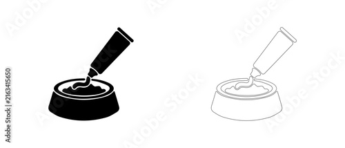 Hand squeezing paste from tube into bowl vector icon filled and outline, vitamin paste and treat dispensing symbol.