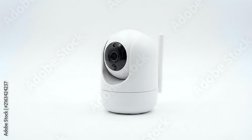Plakat White compact security camera with rotating base and dark lens