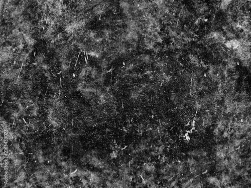 Fotografie Grungy black surface with numerous white scratches and dust particles, creating a distressed and textured overlay for abstract or vintage designs