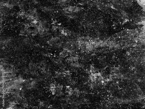 Фотография Grungy black surface with numerous white scratches and dust particles, creating a distressed and textured overlay for abstract or vintage designs