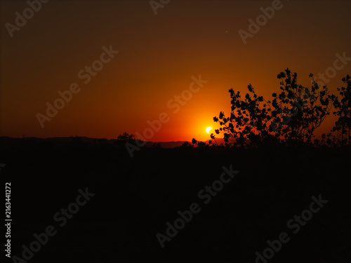 Partial solar eclipse in 2026 at the city of Zagreb, Croatia when moon covered part of the sun at sunset