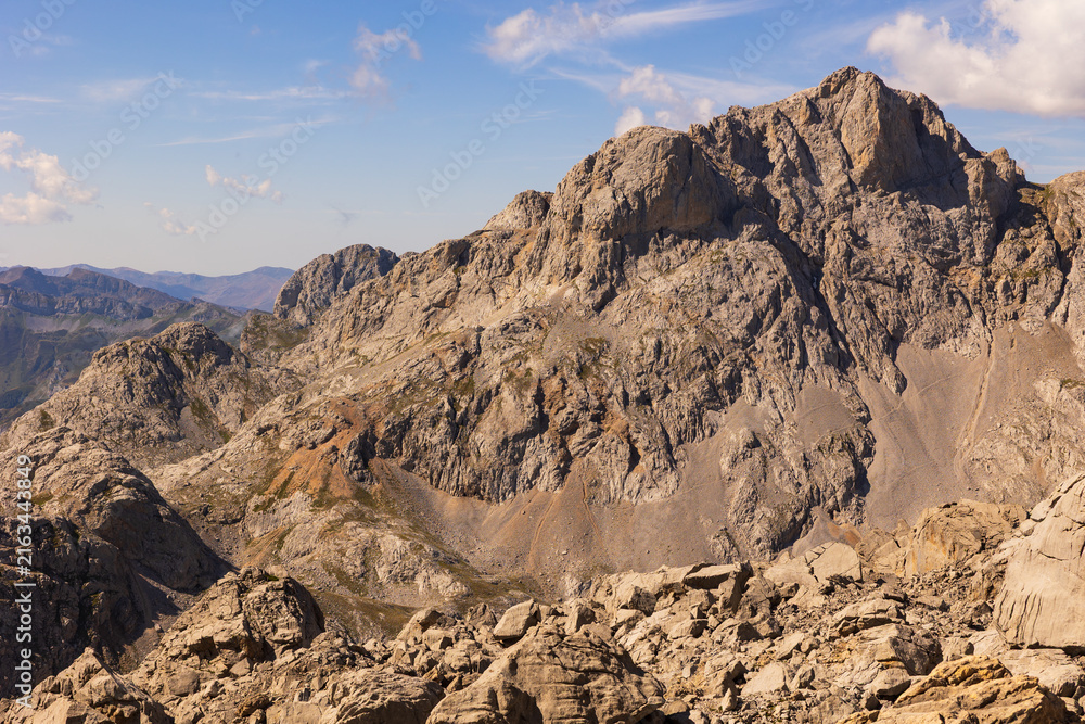 Naklejka premium View of the peaks of the Picos de Europa mountains in the national parks of Spain. Summer in the mountains of Europe