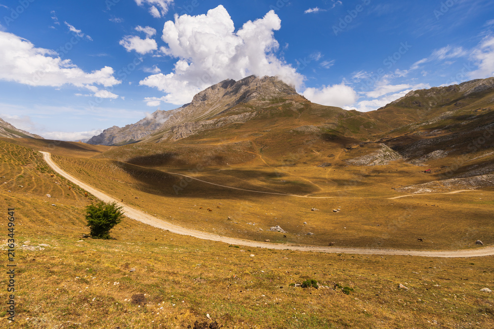 Naklejka premium Wild and deserted places, Picos mountain range in Spain, Peaks of Europe, hiking trails pass through picturesque mountain landscapes.