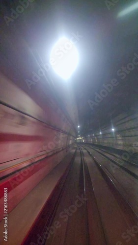 View From Inside Subway Train Moving Through Underground Tunnel