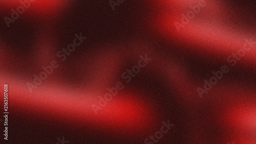 Obraz na płótnie Blurred crimson background with soft gradients and a grainy texture creates a da