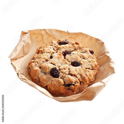 Bakery oatmeal raisin cookie served in brown paper liner