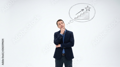 Businessman thinking about career growth and success goals