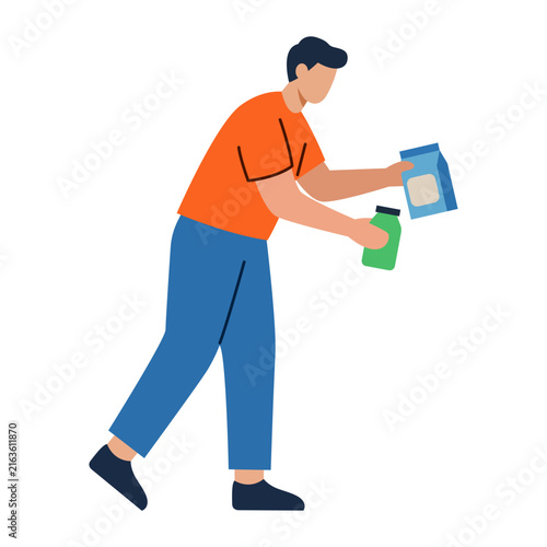 Принти на полотні Male store employee or vendor arranging products and taking stock on shelf flat