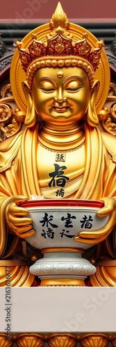 Golden Buddha statue holding soup bowl with Chinese characters, symbolic, statue