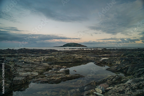 Принти на полотні Looe Island seascape at dusk with dramatic clouds over the sea in Cornwall