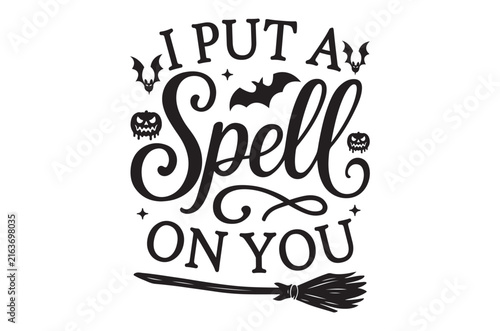Halloween calligraphy with bats and broom on a white background
