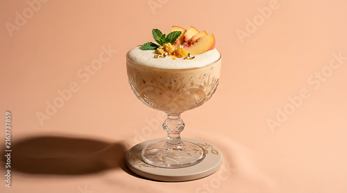 Creamy Peach Smoothie Garnished with Mint and Peach Slices in an Elegant Glass on a Pastel Background