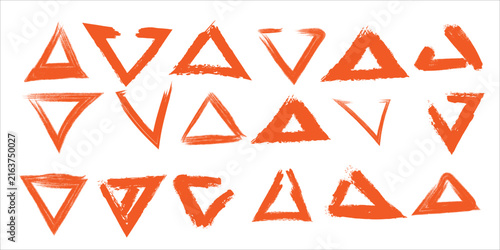 Set of hand drawn orange triangle shapes created with a dry brush texture on a white background