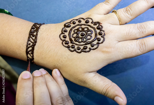 Traditional Henna Mehndi Design On Woman Hand With Intricate Floral Patterns