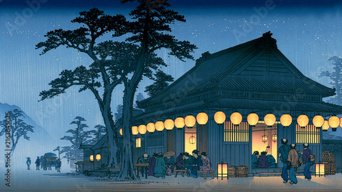 Traditional Japanese woodblock print of an evening post station with glowing lanterns