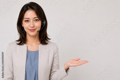 Smiling Female Customer Support Representative Thanking Clients After Successful Service