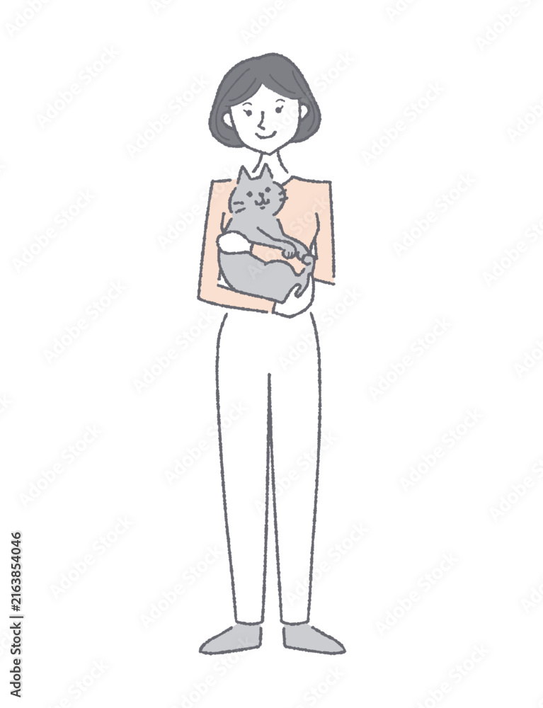 Fototapeta premium 猫を抱っこする笑顔の若い女性