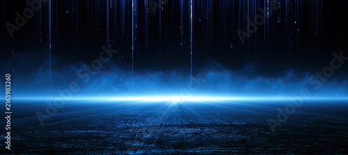 Radiant blue light pierces atmospheric haze from a dark ground