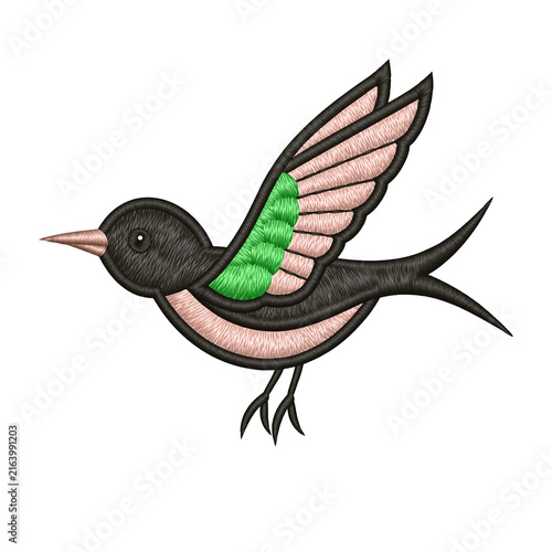 Embroidered bird patch with pink wing and green feather detail in flight