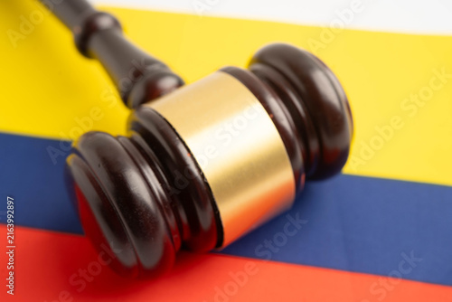 Colombia law, Legal, justice and agreement, wooden court gavel on flag.