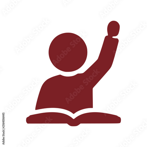 Child Sitting Down Raising Hand In Lesson Class